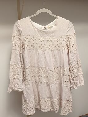 Listicle Eyelet-Tiered Long Sleeve Tunic Dress in Pale Pink